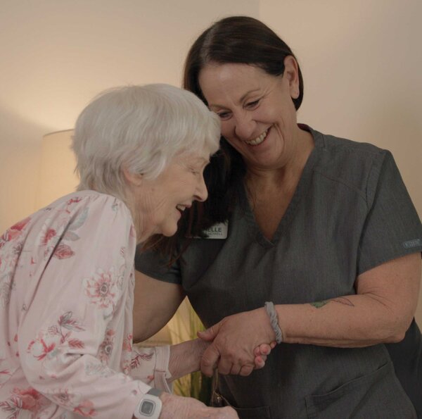 Brentwood Nurse Helping Female Senior