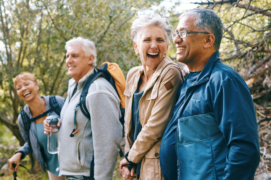 4 senior care facility residents on a hike 