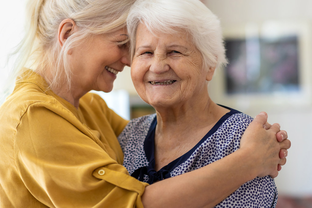 Middle-aged adult caring for an elderly loved one with dementia.